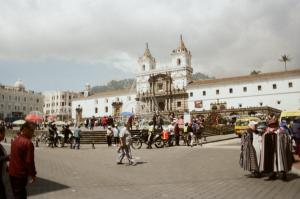 people walking about in the city.